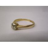 A gold coloured and platinum solitaire diamond ring, approximately 0.4ct, stamped 18ct plat, size