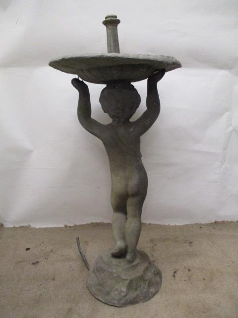 A mid 20th century lead fountain with a bowl, elevated by a boy on a rocky base, 33"h x 15"w - Image 2 of 5