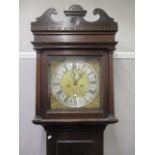 A George III long case clock, with an eight-day movement and later gong, a brass dial, silvered
