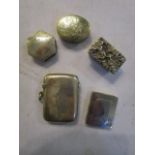 A late Victorian silver vesta case with engraved initials and a group of continental silver and