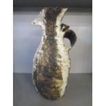 Benny Sirota 20th century British - studio pottery bird jug, textured surface decorated in brown and