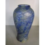 A Martin Bros stoneware inverted baluster vase, cracked ice on a mottled blue ground glaze,