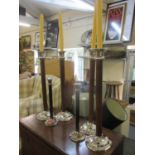 Three pairs of contemporary Kenneth Turner leather and silver plated candlesticks