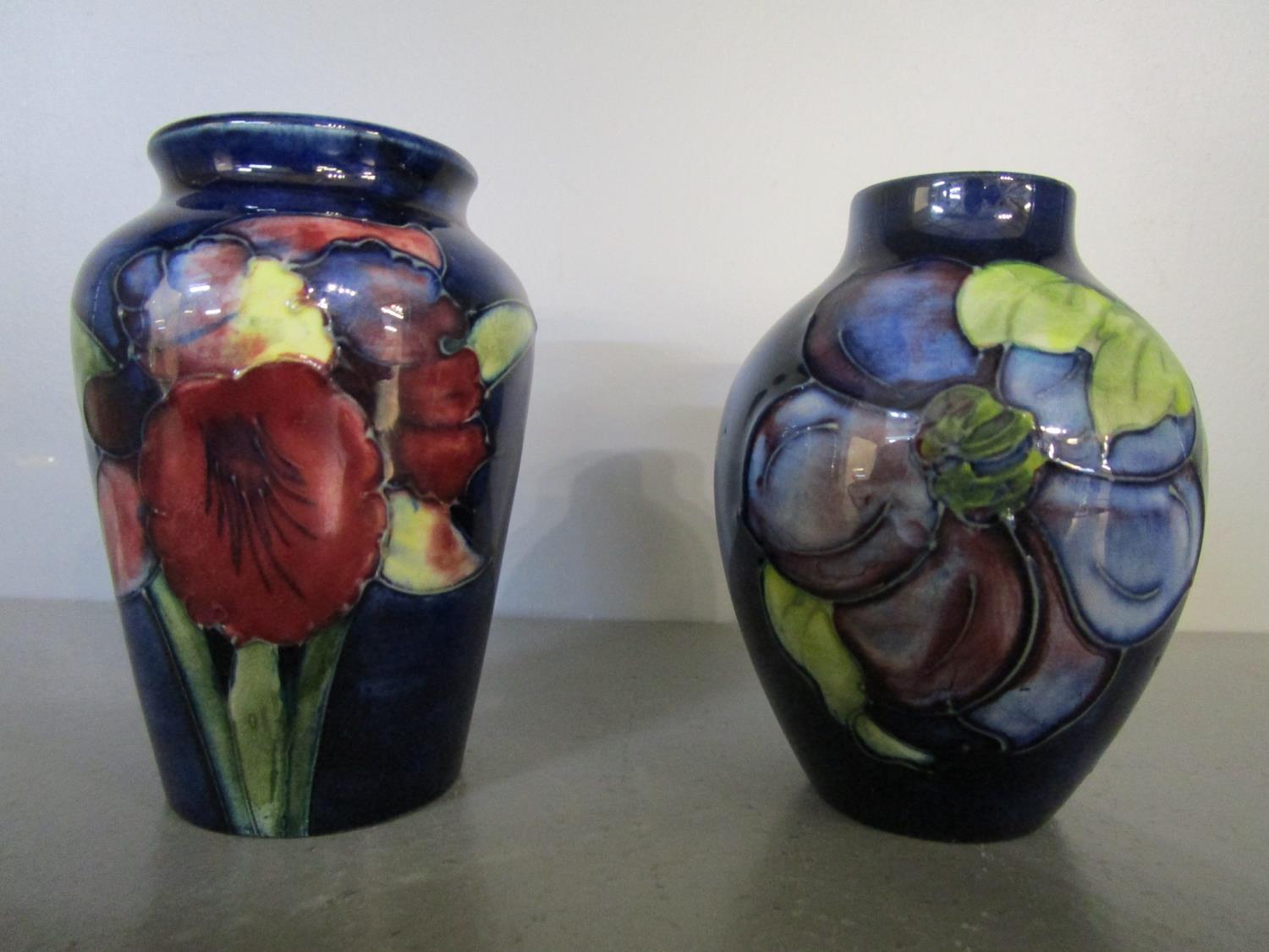 Two Moorcroft Pottery small vases, one of shouldered form decorated with two tube lined iris, 3 5/
