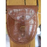 A late 20th century Mulberry mid brown saddle shoulder bag in a crocodile textured leather,