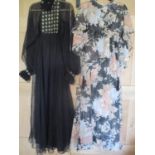 A 1970s Jean Varon (John Bates) black evening gown with embroidered front and back panel and