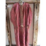 An early to mid 20th century, possibly Egyptian, gents red and brocade kaftan with belt and matching