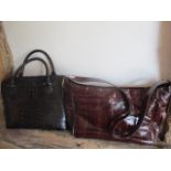 A black crocodile vintage style handbag, together with a brown eel skin shoulder bag
