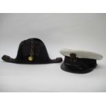 A 19th century Royal Naval officers bicorn beaver skin hat with edging and gold coloured braid;