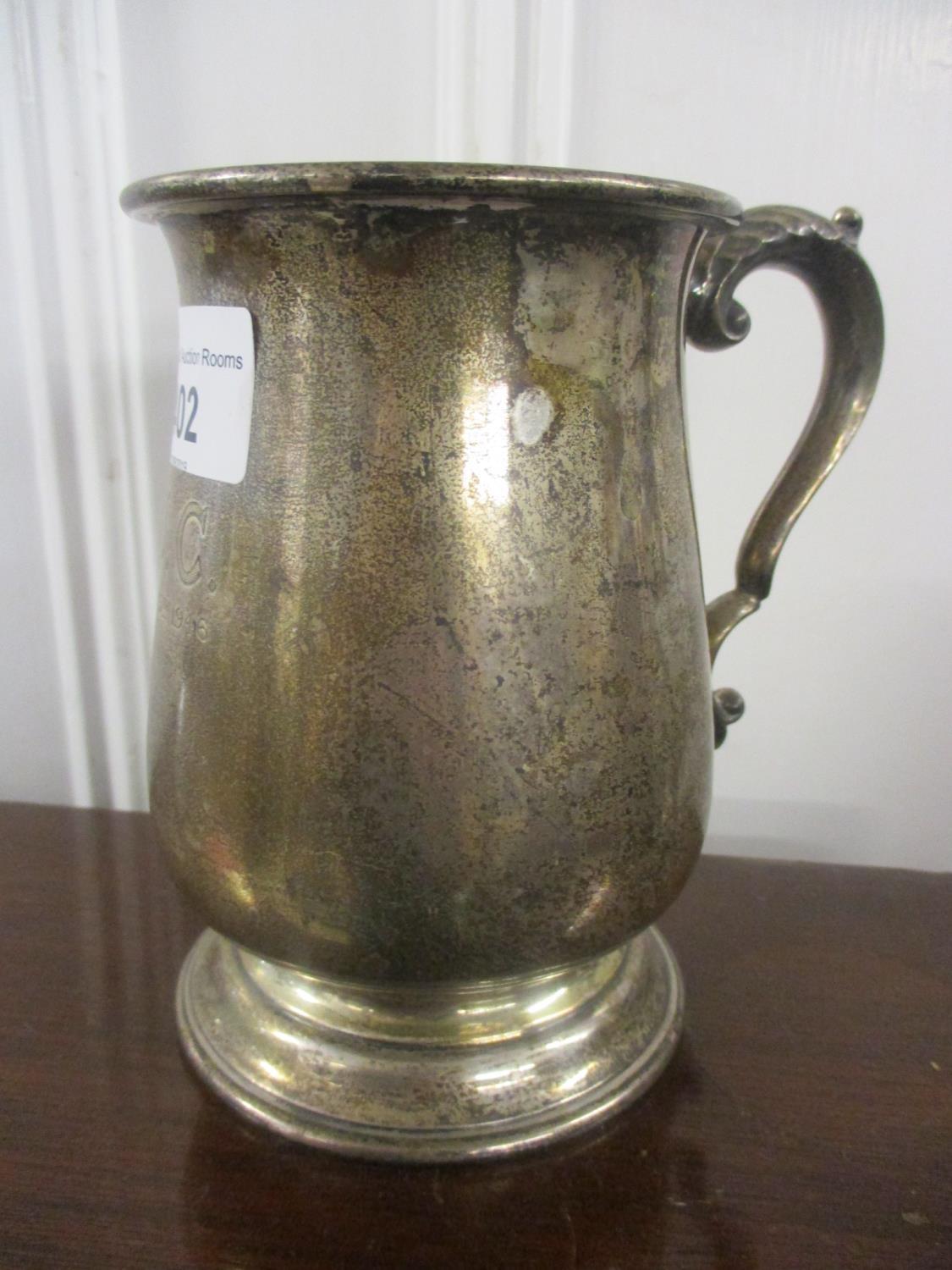 An early 20th century silver tankard