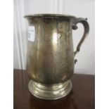 An early 20th century silver tankard