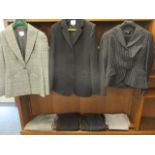 Two ladies Armani Collezioni trouser suits, one ladies Paul Smith trouser suit and a pair of Paul