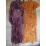 A 1970s Jean Varon (John Bates) pink floral maxi dress with high collar and ruffle design to the