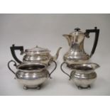 An early 20th century silver four piece teaset by Henry Matthews Birmingham 1923 of oval, bulbous