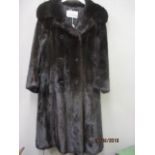 A Max Mitzman three quarter length black mink coat