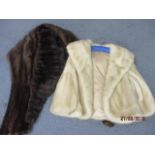 A vintage arctic mink bolero style jacket with bell style sleeves, approximately 36" chest x 20"