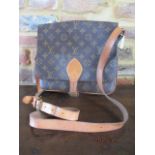 A Louis Vuitton Cartouchlere MM canvas monogram shoulder bag, imprinted 882SL to the interior