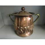 A Victorian hammered Arts & Crafts copper and brass coal bin with tin liner, lid with open bud