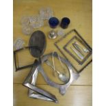 A quantity of silver items to include silver photo frames A/F, mixed glass salts and a pair of