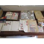 A quantity of stamps, some mounted in albums, to include German stamps, Chinese, Hong Kong and