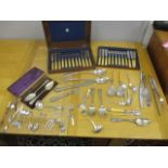 A silver plated cutlery and flatware to include a Kings pattern basting spoon, dessert knives and