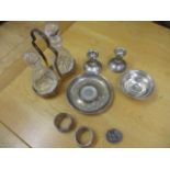 A pair of dwarf silver candlesticks, a silver dish with central mounted 1922 silver Liberty coin,