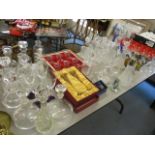 A large selection of glassware to include decanters, claret jugs and other items