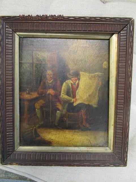 A 19th century oil on board tavern scene of two gentlemen seated, one reading a daily newspaper,