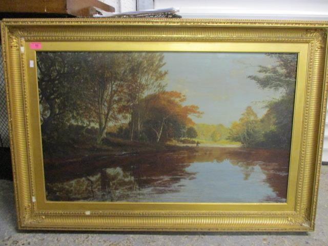 A Victorian oil on canvas landscape scene depicting a man fishing on a river, 35 1/2" x 21 1/2",