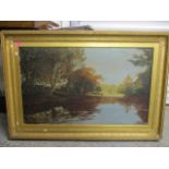 A Victorian oil on canvas landscape scene depicting a man fishing on a river, 35 1/2" x 21 1/2",