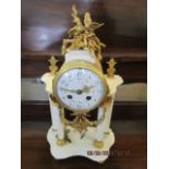 A late 19th century/Edwardian French white marble mantle clock with gilt metal mounts, white