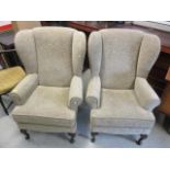 A pair of wing back chairs