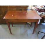 An Edwardian mahogany side table with a single drawer, standing on block feet, 29" h x 37"w