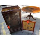 An early 20th century mahogany display cabinet, together with a tapestry firescreen