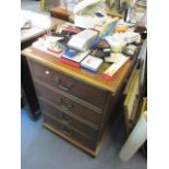 A modern mahogany two drawer filing cabinet having swan neck handles and a leather top, 32 1/2" h