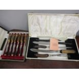 A cased carving set, together with an antler-handled cased knife set