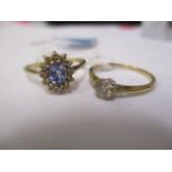 A 9ct gold ring set with a solitaire diamond and the other set with a sapphire and diamonds, 3g