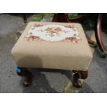 A 19th century mahogany tapestry topped stool on cabriole legs, 16" x 18"