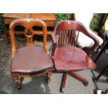 A Victorian leather seated chair, together with a modern swivel armchair