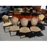 A 19th century and later mahogany dining table, together with a set of ten shield back early 20th