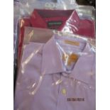 A collection of good quality men's shirts to include Yves Saint Laurent, Tissot, Rochas and Kenzo,