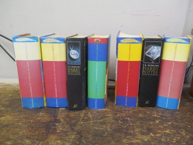 Seven 1st Edition Harry Potter books, four different titles