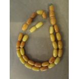 A string of butterscotch amber rosary beads, total weight 8.7g