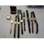 A mixed lot of ladies' and gents' wristwatches, and two folding dressing table clocks to include a