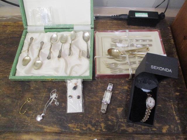 Italian silver teaspoons stamped 800, a wristwatch, a pendant and earrings, a locket, a bracelet and