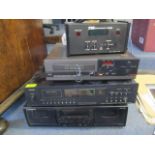 A stereo comprising a Mission DAD 7000 CD player an Aurex ST-530B Toshiba tuner and a Pioneer CT-