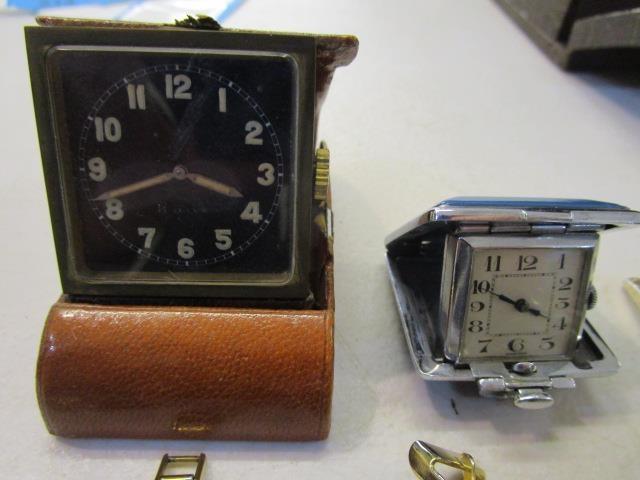 A mixed lot of ladies' and gents' wristwatches, and two folding dressing table clocks to include a - Image 2 of 4