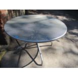 A modern chrome circular garden table, 30"h x 47 1/2"w