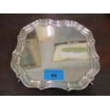 A silver card tray raised on four splayed feet 235g