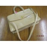 A late 20th century Francesco Biasia leather handbag with detachable shoulder strap, in a cream mock